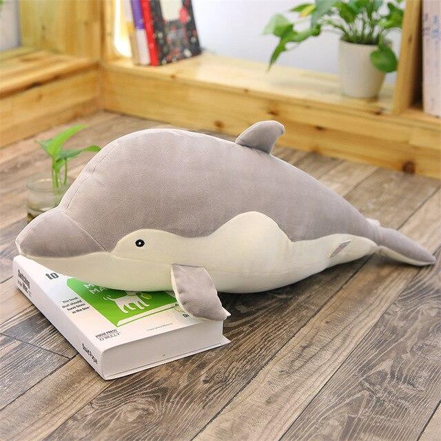 Gray plush dolphin body pillow; soft, premium PP cotton filling; promotes relaxation and better sleep. Multiple sizes available.