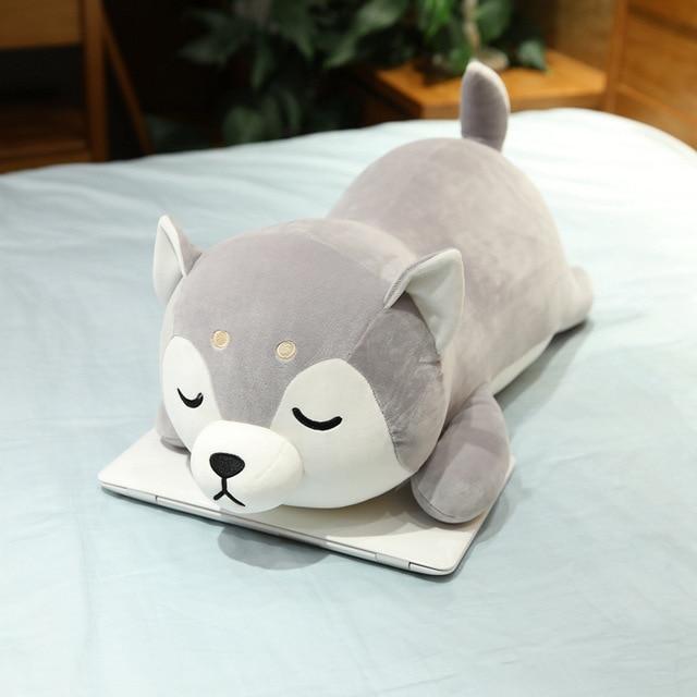 Gray Siberian Husky plush toy, soft PP cotton filling, adorable sleeping pose, perfect cuddle buddy.