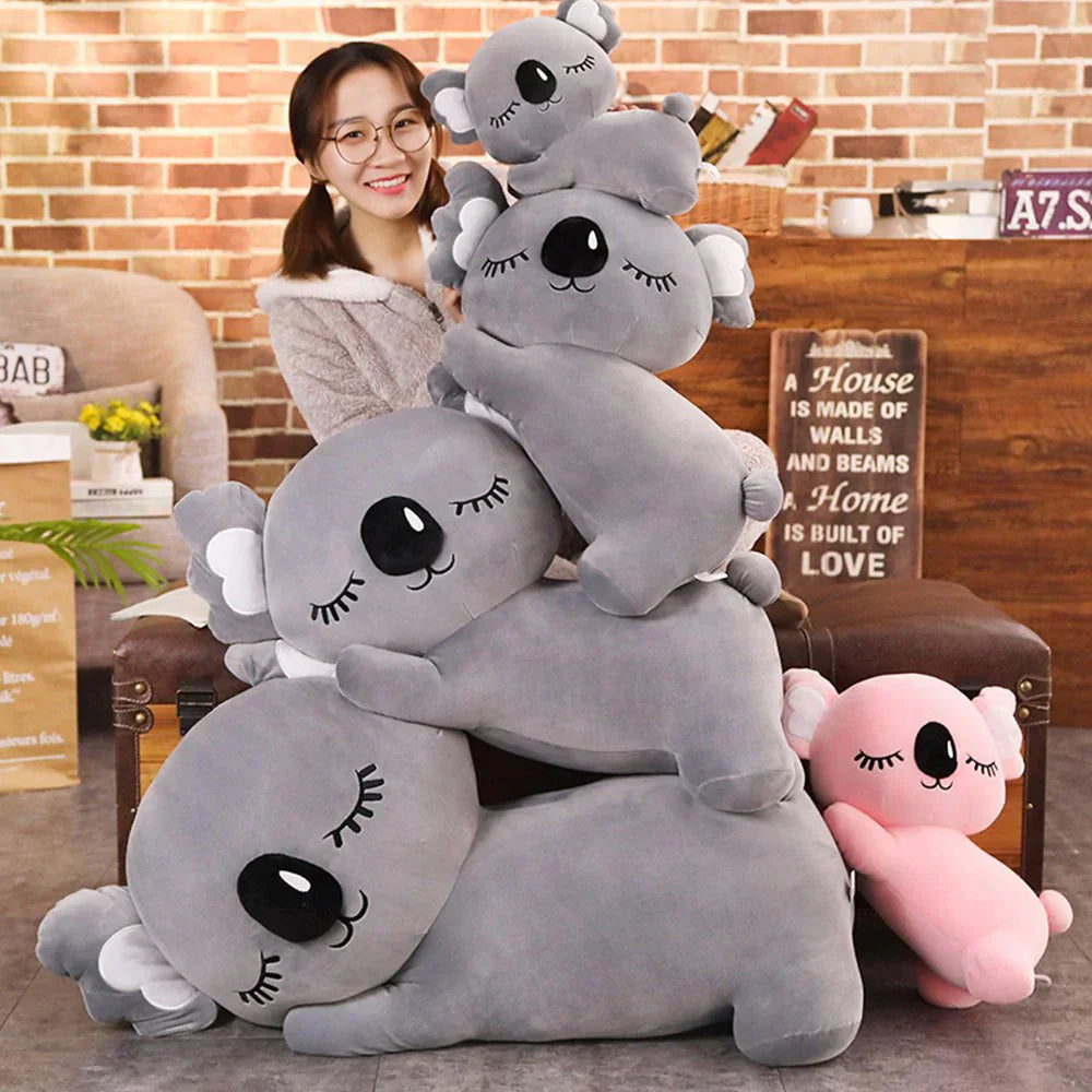 Soft gray & pink hypoallergenic koala plush toys, various sizes, perfect for cuddling.  Ethically sourced PP cotton.