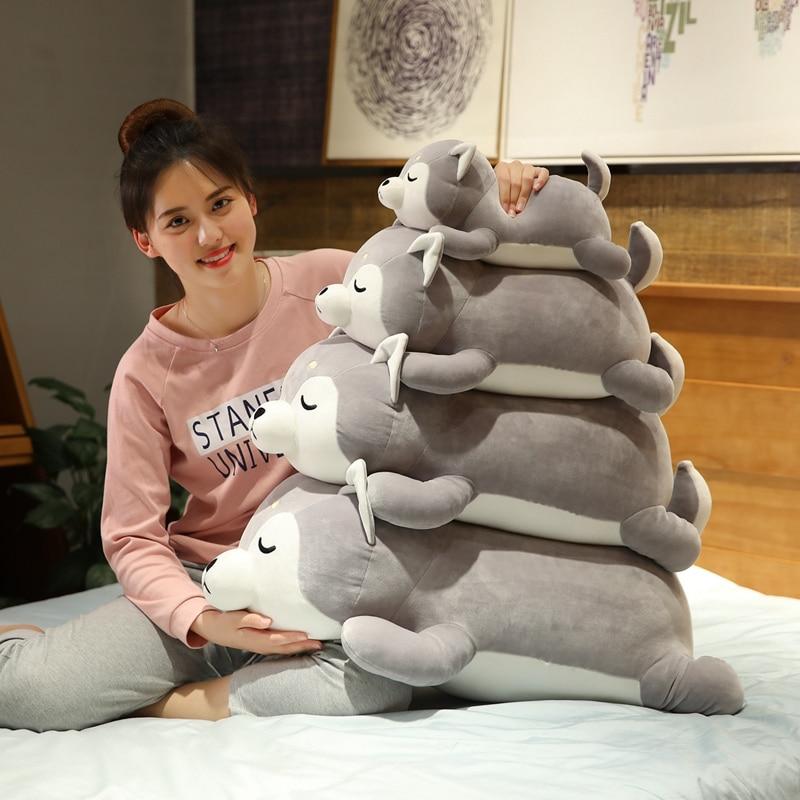 Stack of four gray Siberian Husky plush toys, made of soft PP cotton, perfect for cuddling.