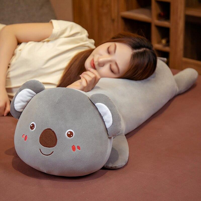 Grey koala plush pillow buddy, soft PP cotton, ergonomic design, improves sleep posture.