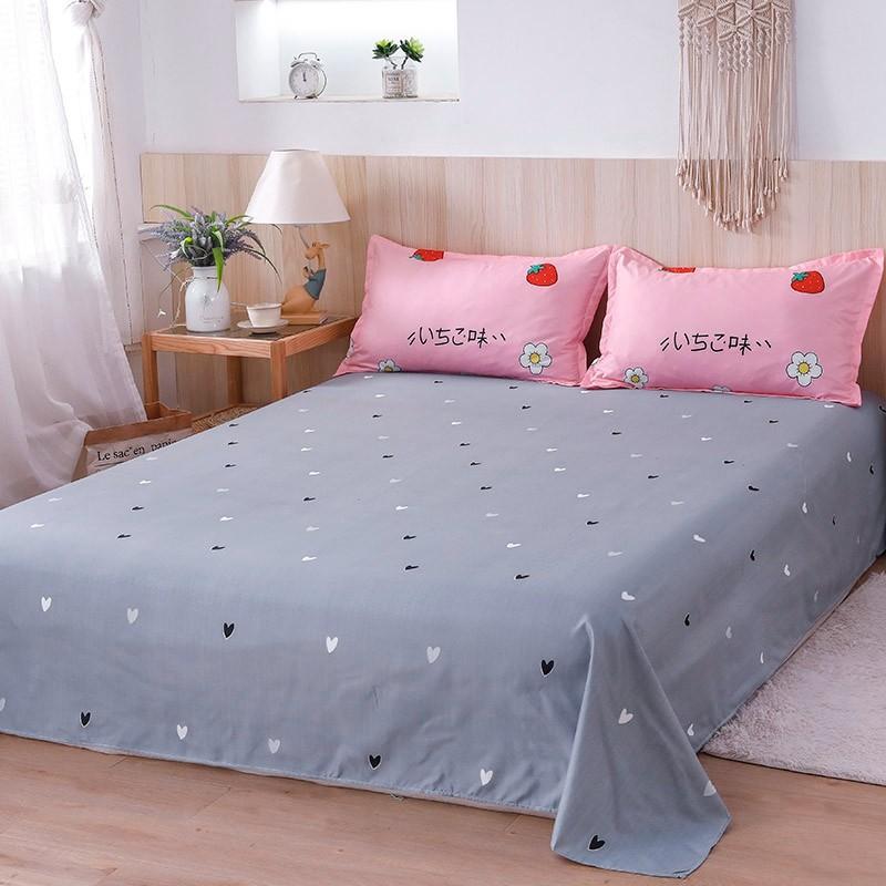 Grey microfiber bedding set with pink strawberry print pillowcases, reversible design, and zip closure. Includes duvet cover, flat sheet & pillowcases.