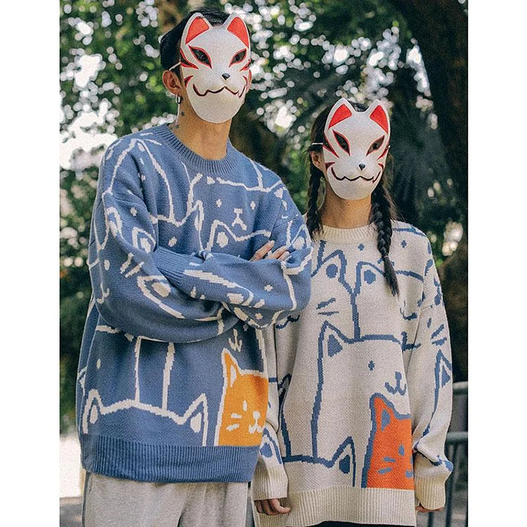 Harajuku style blue cotton sweater featuring an adorable cartoon cat pattern, long sleeves, and a classic round neck.