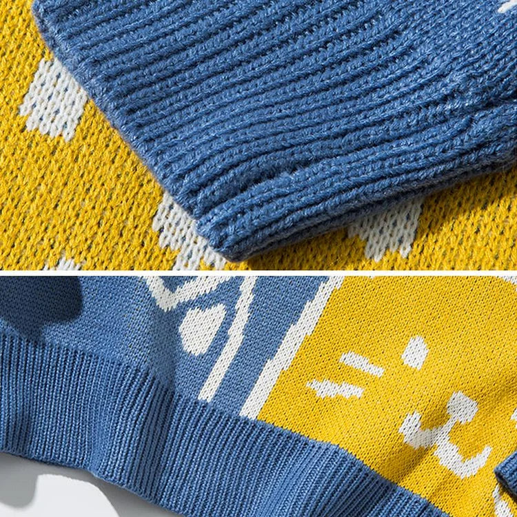 Harajuku style blue and yellow cotton sweater featuring an adorable cartoon cat design. Long sleeves, round neck.