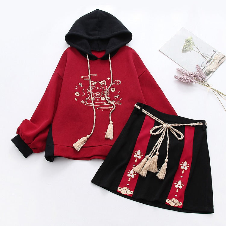 Red & black Harajuku lucky cat hoodie & mini skirt set; soft cotton blend; embroidered details; drawstring hoodie; stylish & comfy.