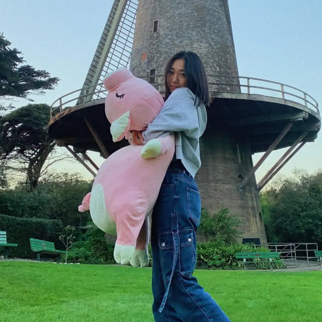 Giant 43" pink Jaja pig plush toy; soft PP cotton, hypoallergenic, huggable, for all ages.