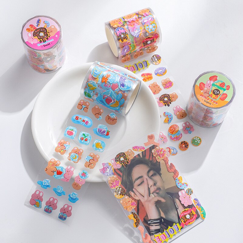 Kawaii animal & donut art paper stickers; 1 roll of assorted designs. Perfect for journaling & decoration.
