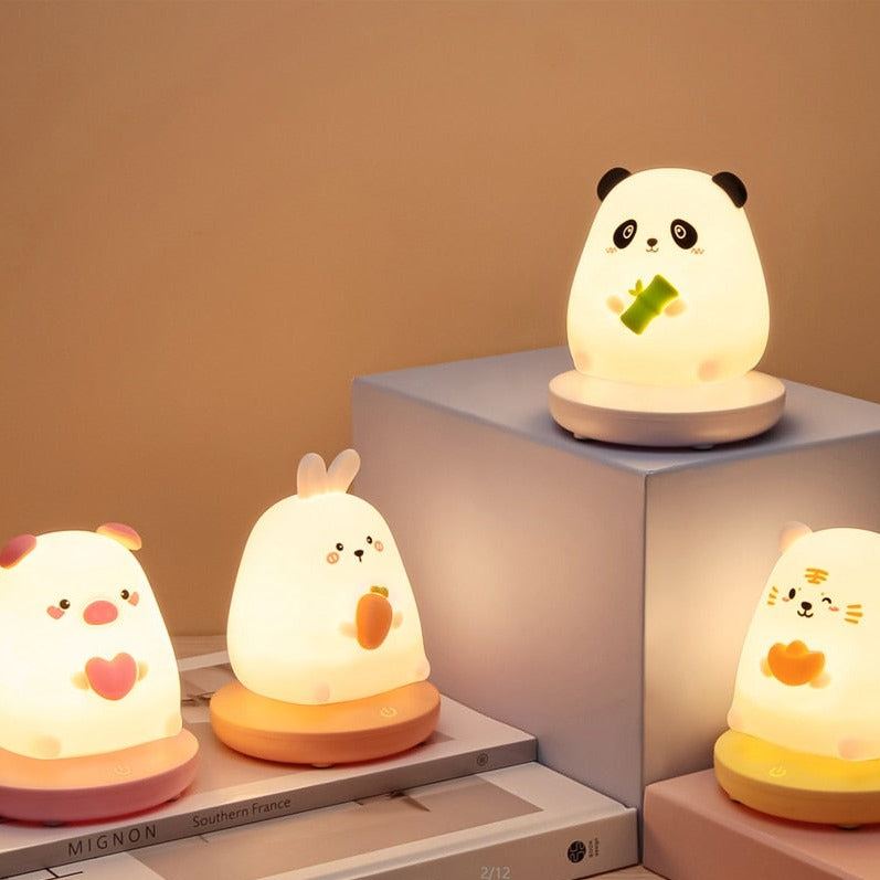Kawaii animal LED night lights; bunny, panda, pig, tiger designs. Soft silicone, 3 brightness levels, USB rechargeable, 10-hour battery life. 10x10x13cm.