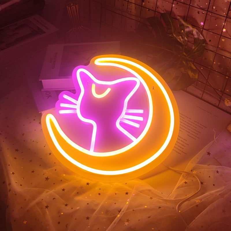 Kawaii anime cat neon sign; pink cat in yellow crescent moon; acrylic LED; 30x30cm; USB powered; wall mountable or tabletop.