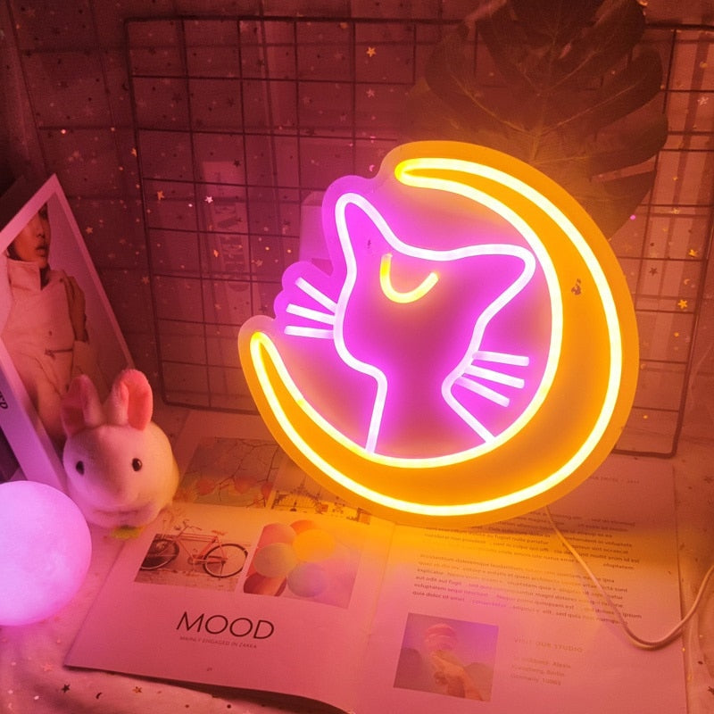 Kawaii anime cat neon sign, pink & yellow LED, 30x30cm, wall-mountable or tabletop. USB powered.