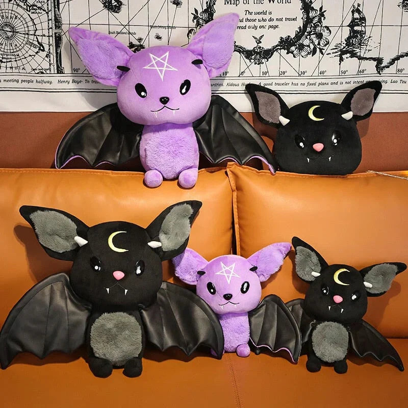 Adorable kawaii bat plushies; purple & black, pentagram & crescent moon designs; soft PP cotton filling; faux leather wings; Halloween-themed.