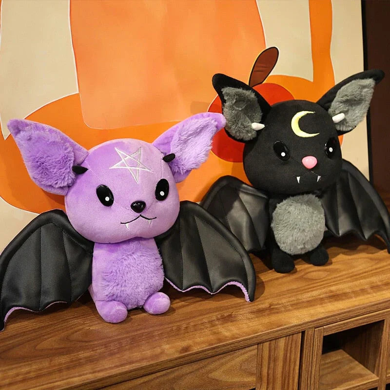 Adorable purple & black kawaii bat plushies with pentagram & crescent moon details, soft PP cotton filling, faux leather wings.