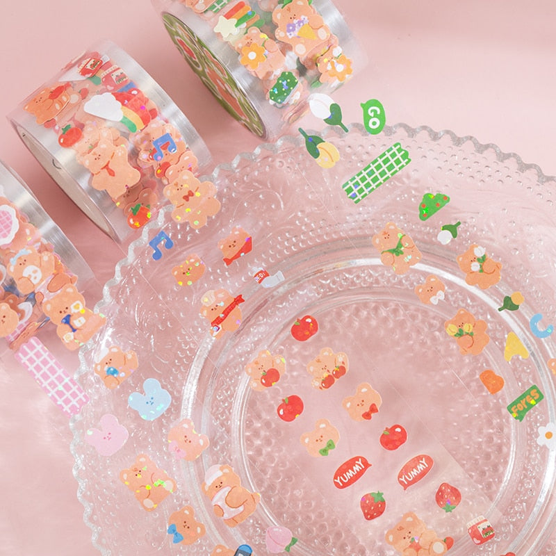 Cute kawaii bear masking tape; 3m roll, 25mm width, featuring pastel bears, fruits, and other fun designs. Perfect for journaling & crafts.