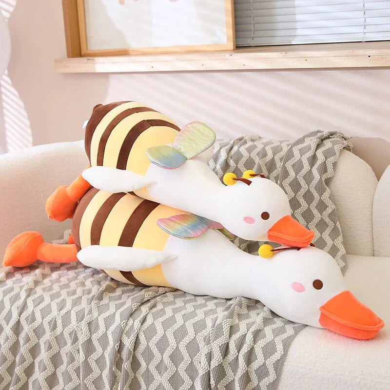 Adorable half bee half swan plush toy with rainbow wings, PP cotton filling, and multiple sizes. Soft, huggable, and allergy-friendly.