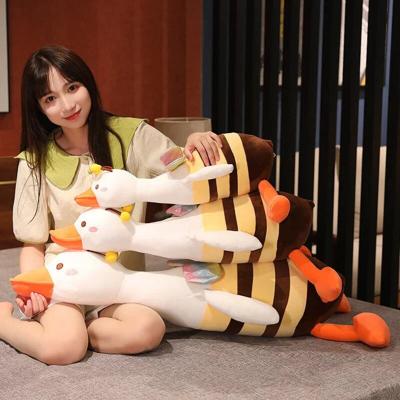 Adorable half bee half swan plush toy with rainbow wings, soft plush material, and PP cotton filling. Available in four sizes.