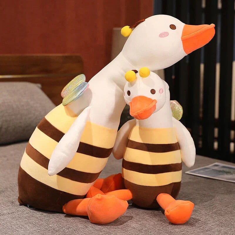 Adorable half bee half swan plush toy with rainbow wings, soft PP cotton filling, and brown-yellow striped body.