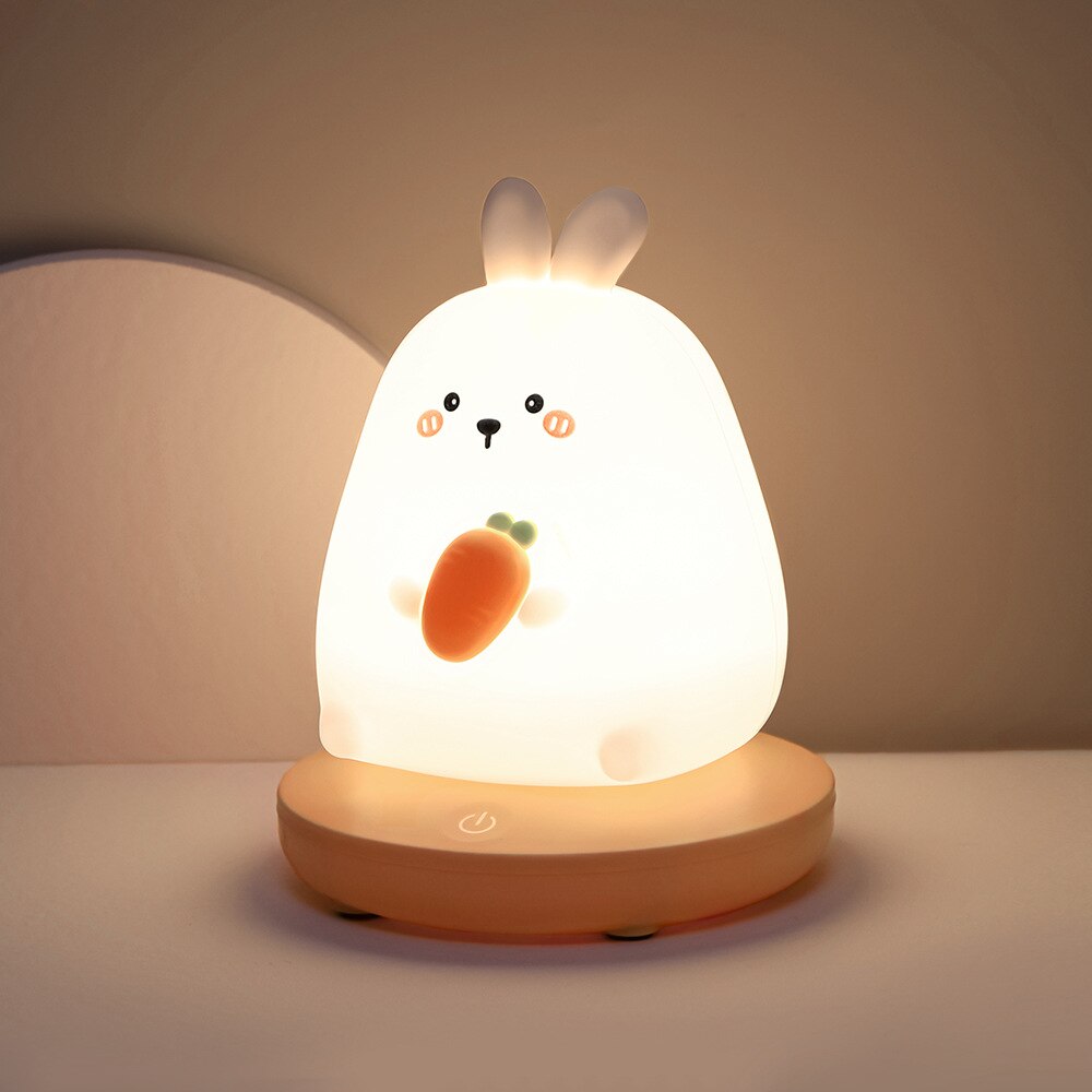 Kawaii bunny silicone night light, warm white LED, USB rechargeable, 3 brightness levels, holds carrot.