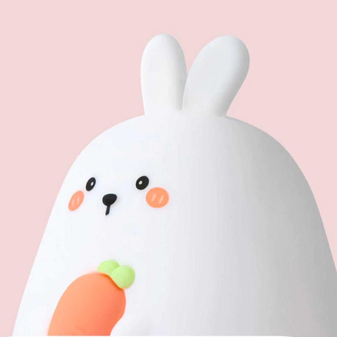 Kawaii white silicone bunny night light with orange carrot, 3 brightness settings, USB rechargeable.