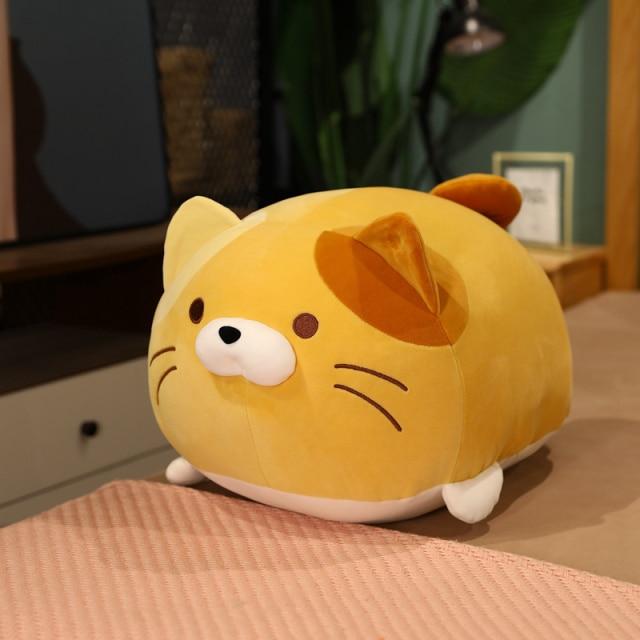 Adorable chubby kawaii cat plush toy; yellow with brown patches, soft PP cotton filling, hypoallergenic. Perfect cuddle buddy!