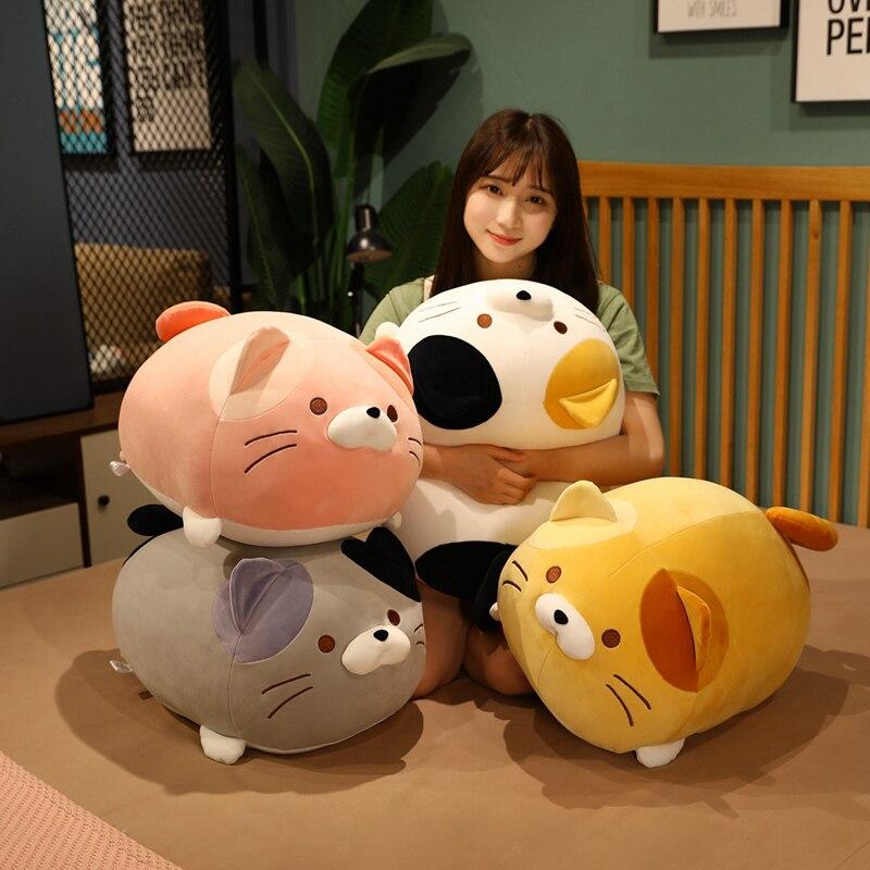 Adorable chubby kawaii cat plushies; soft, PP cotton filled, hypoallergenic, and perfect for cuddling.  Various colors available.