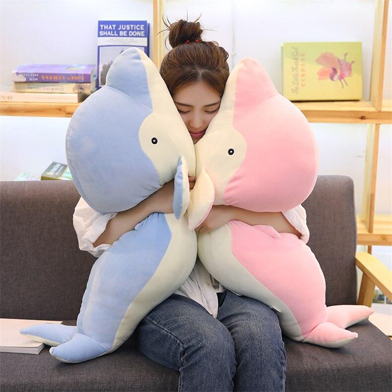 Kawaii plush dolphin body pillows; blue, pink, & gray; soft PP cotton filling; promotes relaxation & better sleep.