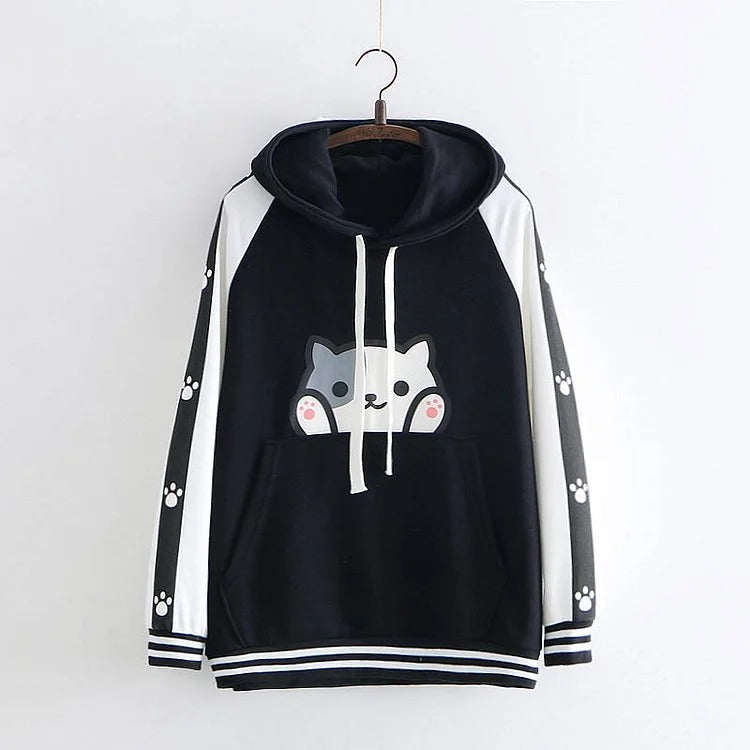 Black & white kawaii kitty paw print hoodie; polyester, long sleeves, one size fits most.  Cute cartoon design.