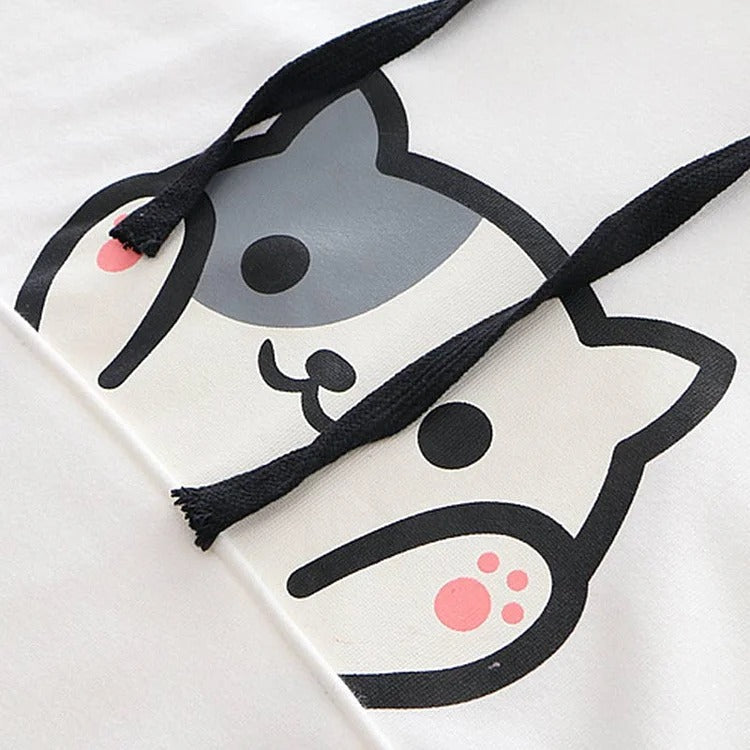 Kawaii kitty paw print hoodie, white with black details, polyester, one size fits most, long sleeves, hooded.