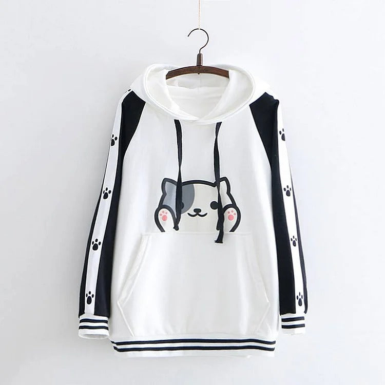 Kawaii white polyester hoodie with black sleeves, cute kitty paw print design, and long sleeves. One size fits most.