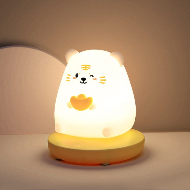 Kawaii tiger silicone night light, warm white LED, 3 brightness settings, USB rechargeable, 10hr battery life.