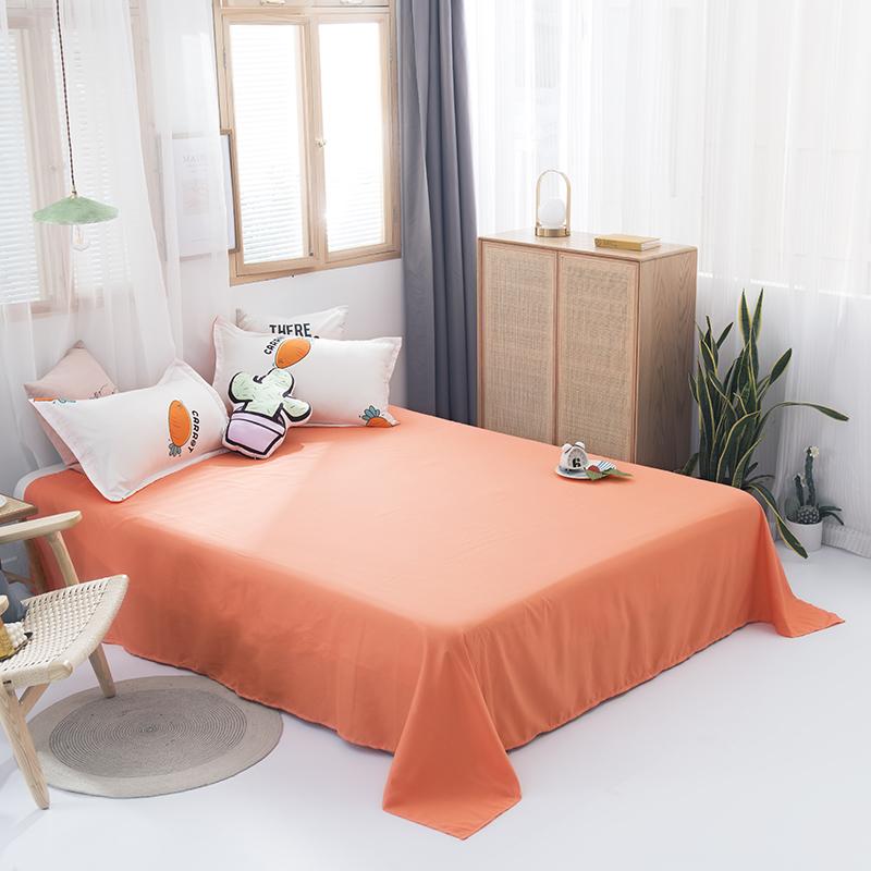 Orange kids' bedding set featuring bunnies and carrots. Soft, 100% polyester microfiber, reversible design. Includes duvet cover, sheet, pillowcases.