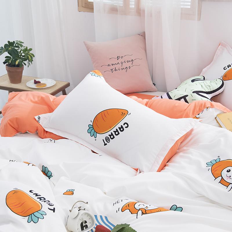 Kids' orange & white bunny carrot bedding set. Reversible, 100% polyester microfiber. Soft, comfy, and allergy-friendly.