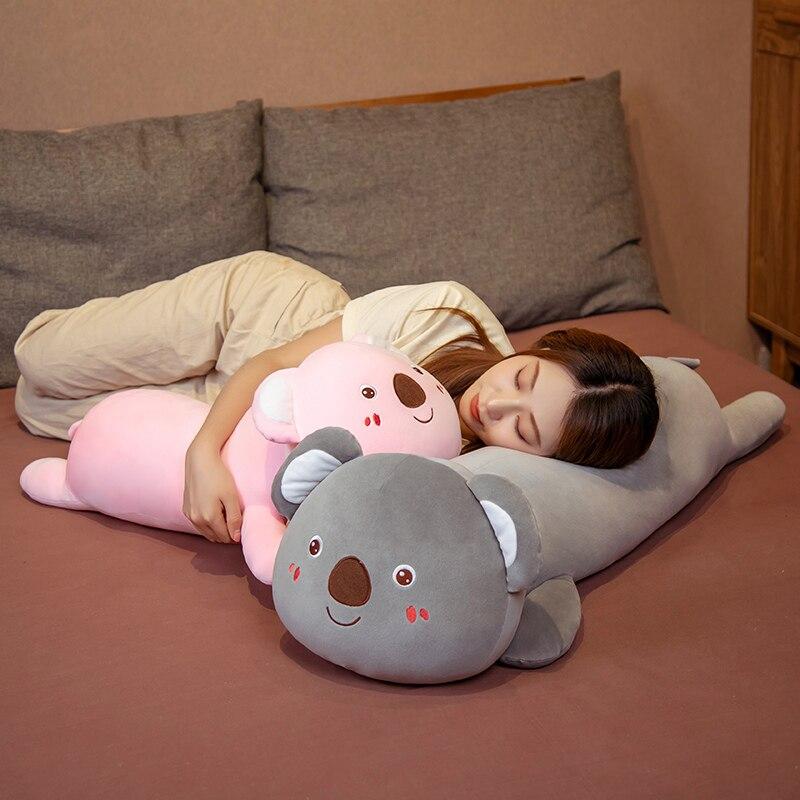Soft pink & grey koala plush pillow buddies; perfect for cuddling & sleep. Premium PP cotton filling, ergonomic design.