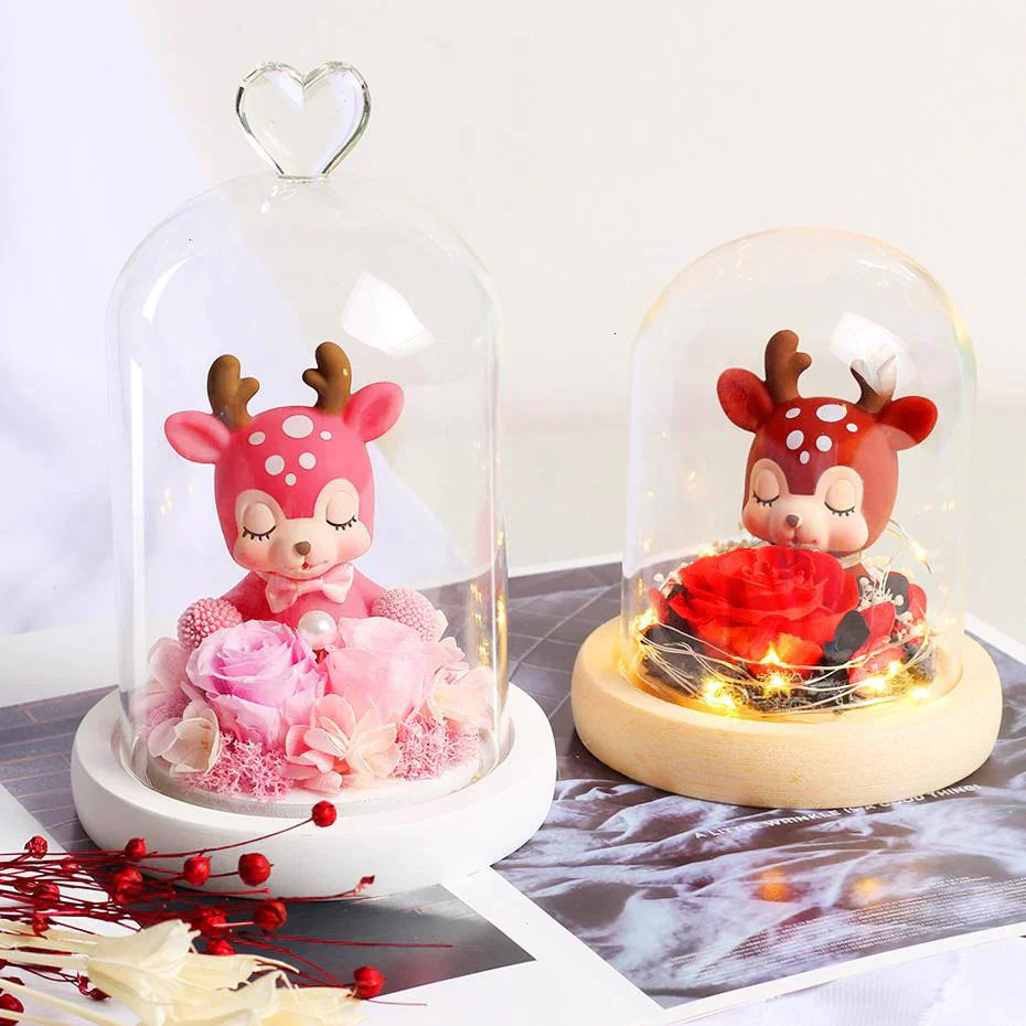 Glass dome LED display with preserved rose & deer figurine; warm light; perfect gift.
