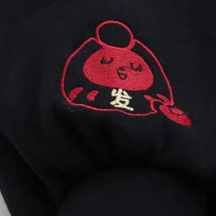 Black cotton hoodie with red embroidered lucky cat, letter print, and tassels; paired with a matching cat paw print mini skirt.