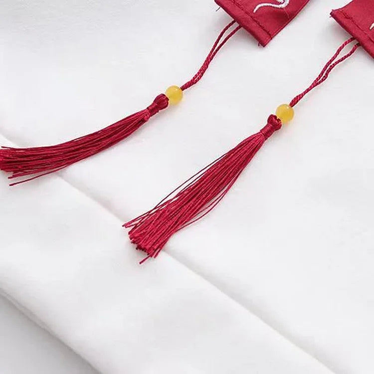 White lucky cat hoodie & skirt set with red tassels, letter print, and cat paw design.  Cotton, comfy, casual.