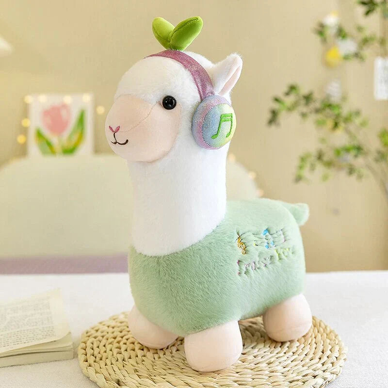 Adorable musical alpaca plush toy in mint green, made of soft cotton, with musical note headphones.