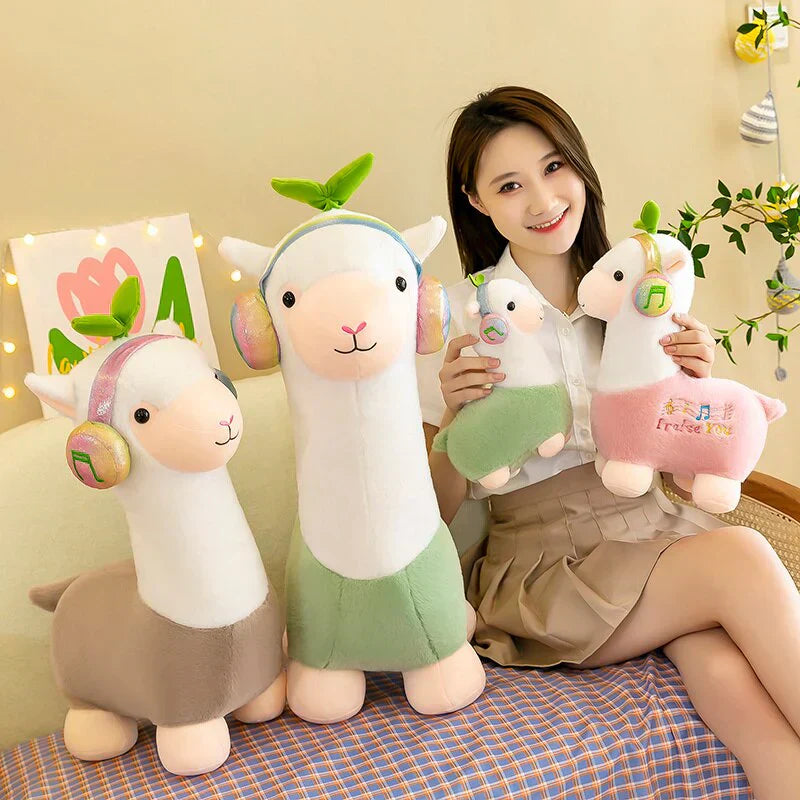 Adorable musical alpaca plush toy; super-soft cotton, ethically sourced, various sizes. Perfect for snuggling!