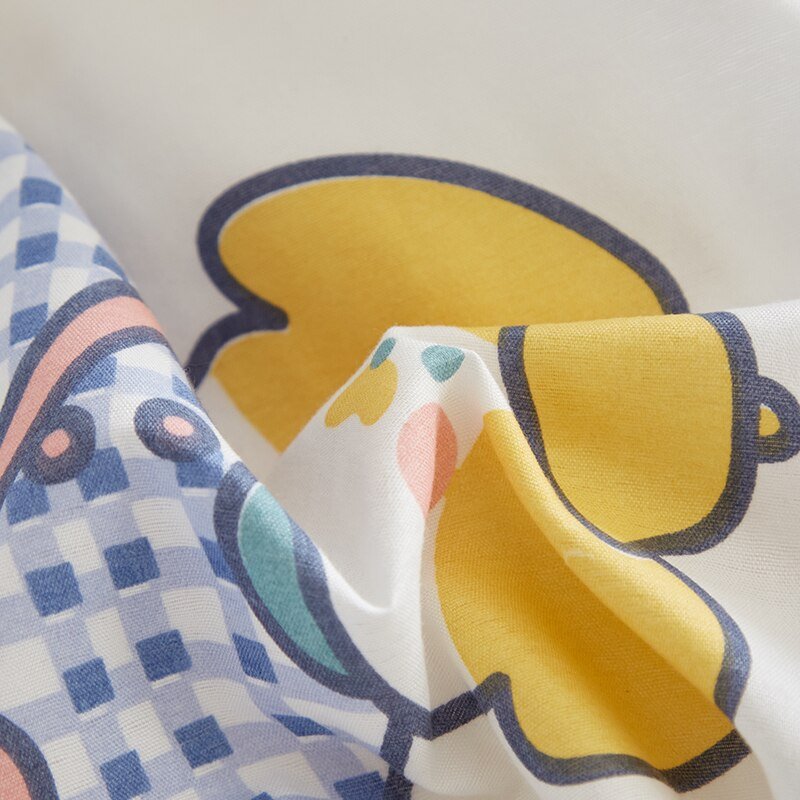 Soft microfiber bunny bedding set in pastel colors; reversible design with gingham & floral patterns; includes duvet cover, flat sheet & pillowcases.