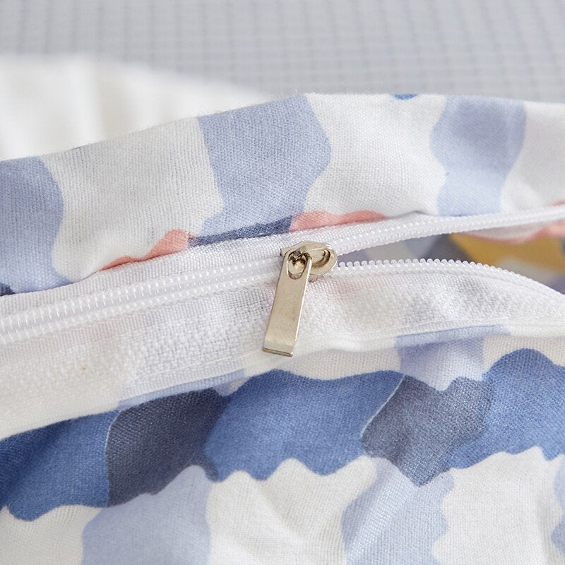Soft microfiber bunny bedding set with pastel floral print, zipper closure, and reversible design. Available in multiple sizes.