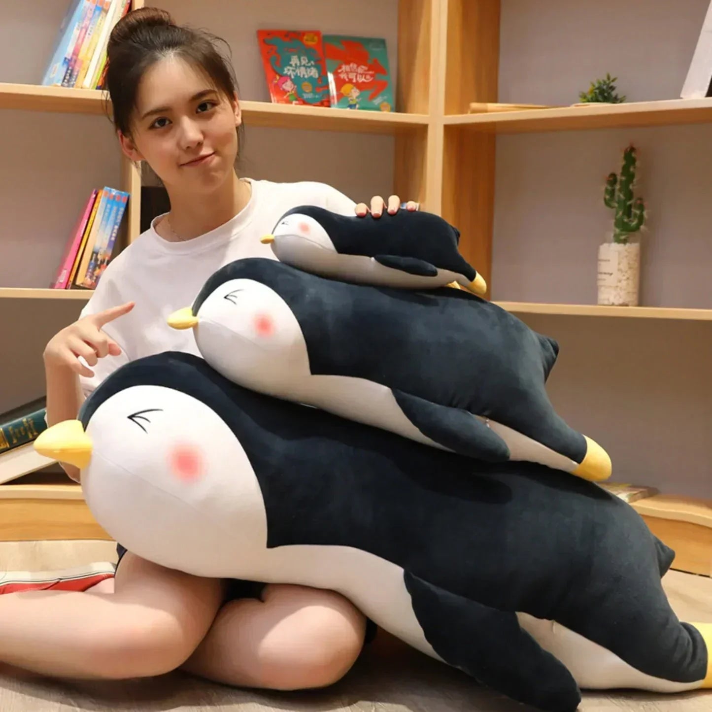 Adorable black & white penguin plush pillows in small, medium & large sizes.  Soft PP cotton filling, perfect for snuggling & gifting.