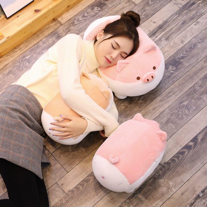 Adorable pink chubby piggy plush toy, made of soft PP cotton, perfect for hugging.  Hypoallergenic and comes in various sizes.