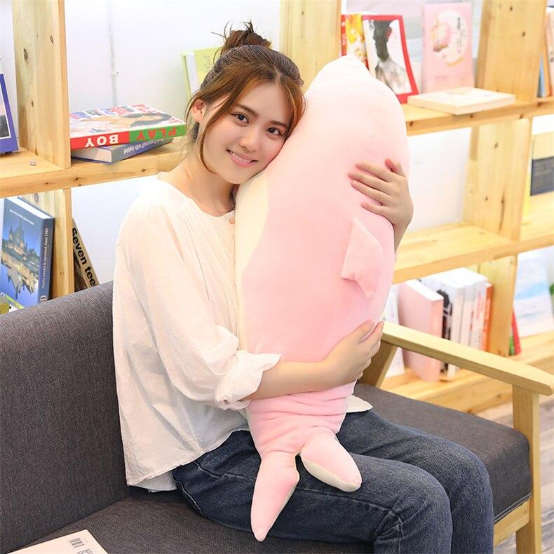 Pink kawaii dolphin plush body pillow; soft PP cotton filling; promotes relaxation and better sleep.