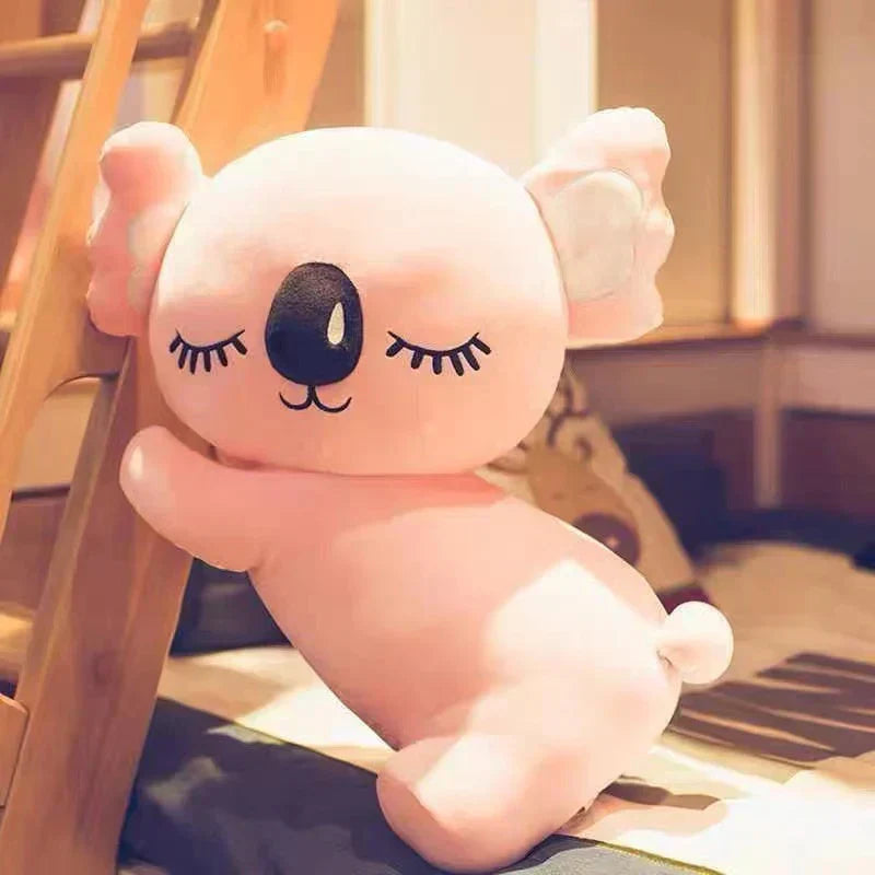 Pink koala plush toy, hypoallergenic PP cotton, soft & cuddly, perfect for sleeping.