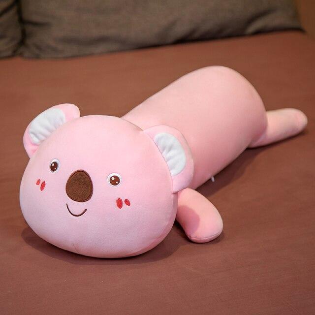 Pink koala plush pillow buddy, soft PP cotton filling, ergonomic design, great for sleep.