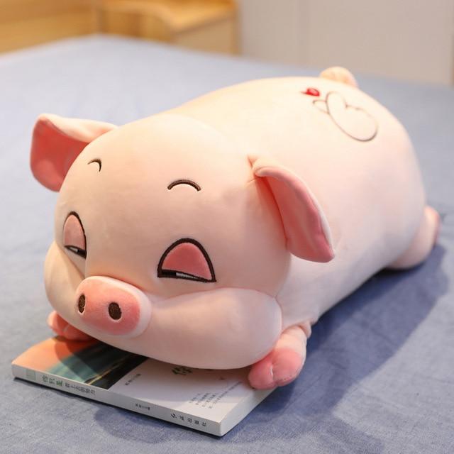Pink pig plush body pillow, super soft PP cotton filling, hypoallergenic, great for sleeping and cuddling.