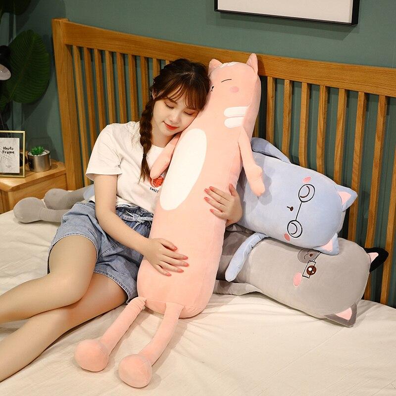 Pink plush cat body pillow, super-soft PP cotton, great for cuddling and sleep.  Hypoallergenic & machine washable.