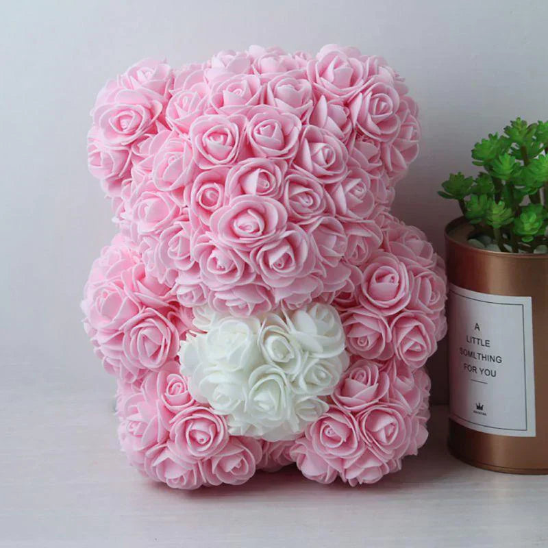 Pink rose bear plush toy, 10 inches, with white rose heart detail; perfect gift, includes gift box.