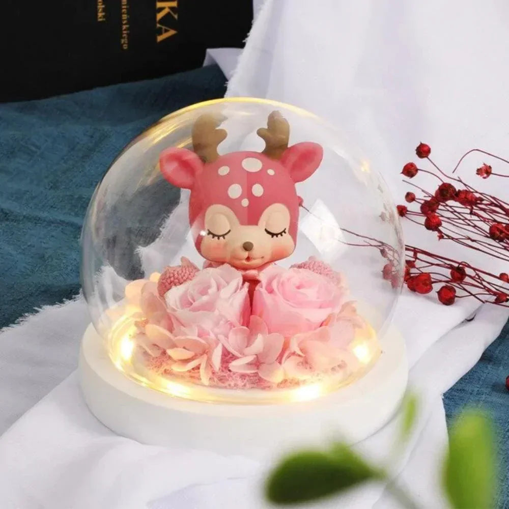 Pink rose & deer figurine LED display in glass dome; charming gift décor.