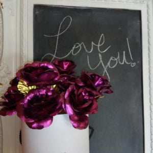 12 iridescent purple galaxy roses in a white gift box with gold accents; 24K gold-dipped polyurethane; perfect gift.