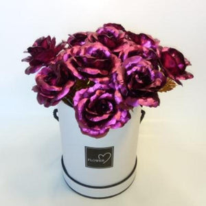12 iridescent purple galaxy roses in a white gift box with a 3D greeting card.  Perfect gift for any occasion.